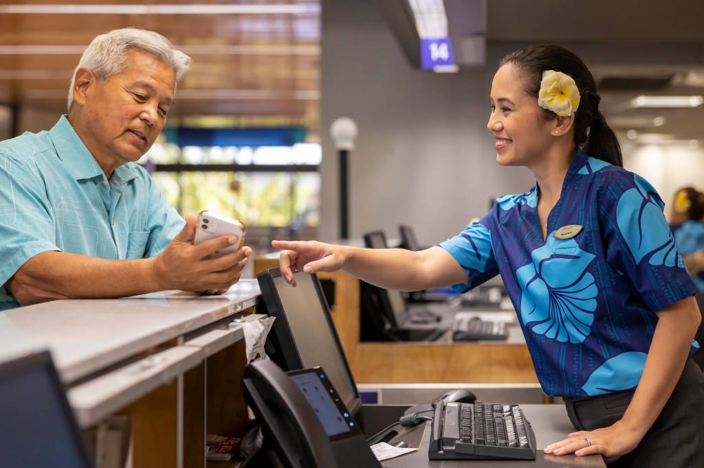 HA Guest Service Agent assisting a customer