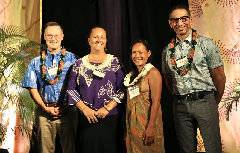 L-R: Joe Sprague, CEO of Hawaiian Airlines; Kumu Karyn Kanekoa and Kumu Charmane Yamada of Pūnana Leo o Lahaina; and Ben Minicucci, CEO of Alaska Air Group 20250211_043856990_iOS