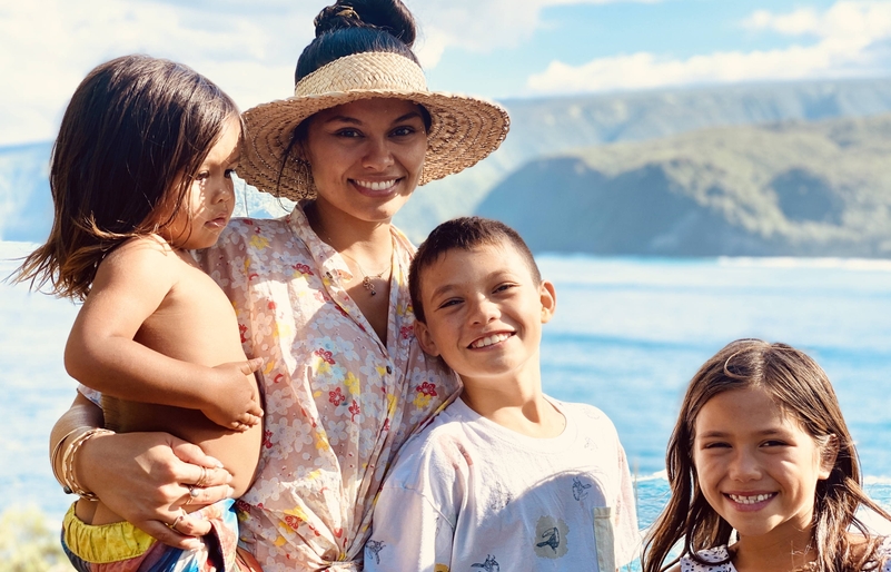 Davis pictured with her three children at the beach. Chelsa Family
