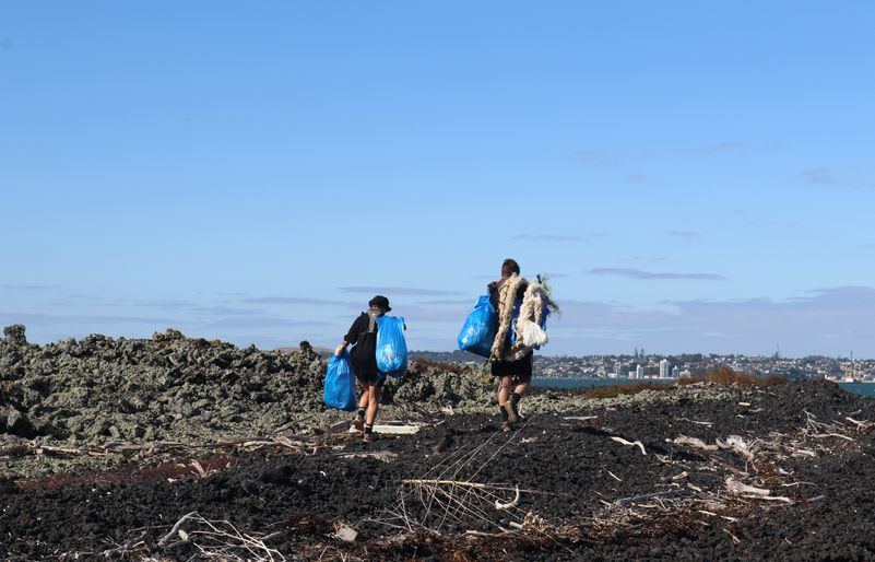 Sea Cleaners volunteers carry away bags of trash and boat-mooring ropes that had washed ashore. IMG_0880 - Copy