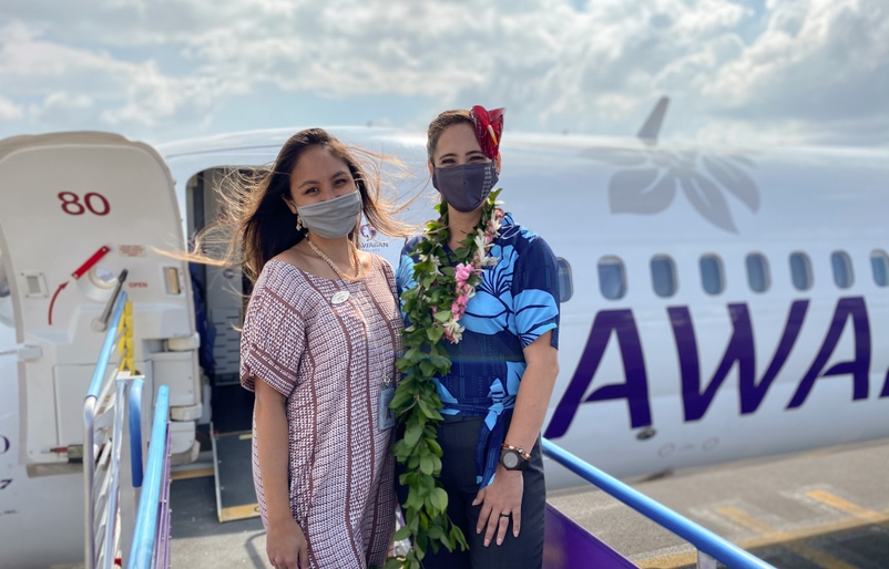 Kahoʻohanohano pictured with Mālia Kruger, one of the Hawaiian language-certified flight attendants who crewed four surprise ʻōlelo Hawai‘i flights between Honolulu and Kona on Feb. 1. IMG_1787