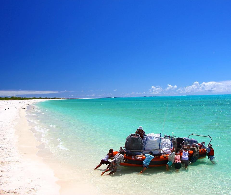 Crews removing washed-up debris from Kure Atoll's shoreline Kure Atoll