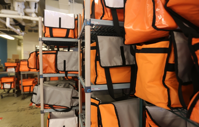 Insulated bags packed with food ready to be delivered to kūpuna on O‘ahu. LMOW bags