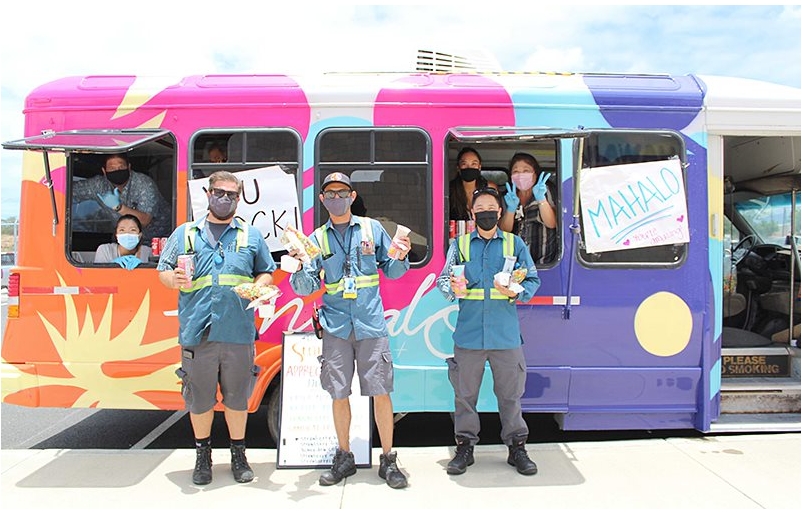 Mahalo Van volunteers serve sweat treats and shakas. MV3