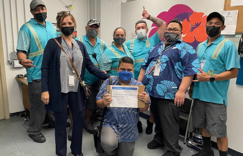 Tanaka, pictured bottom center, with our employees at our Hilo station after his team's Mahina ʻŌlelo Hawaiʻi lesson. Manako