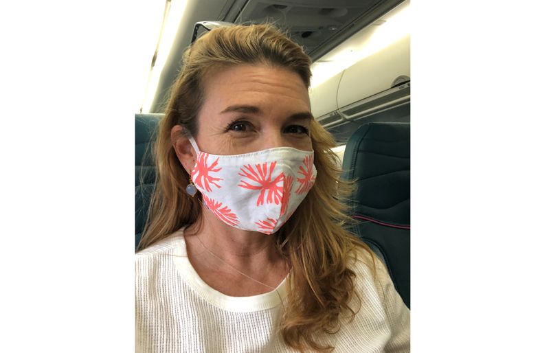 Dr. Catherine Oliver waiting for take-off while traveling via our complimentary Neighbor Island medical flights. oliver